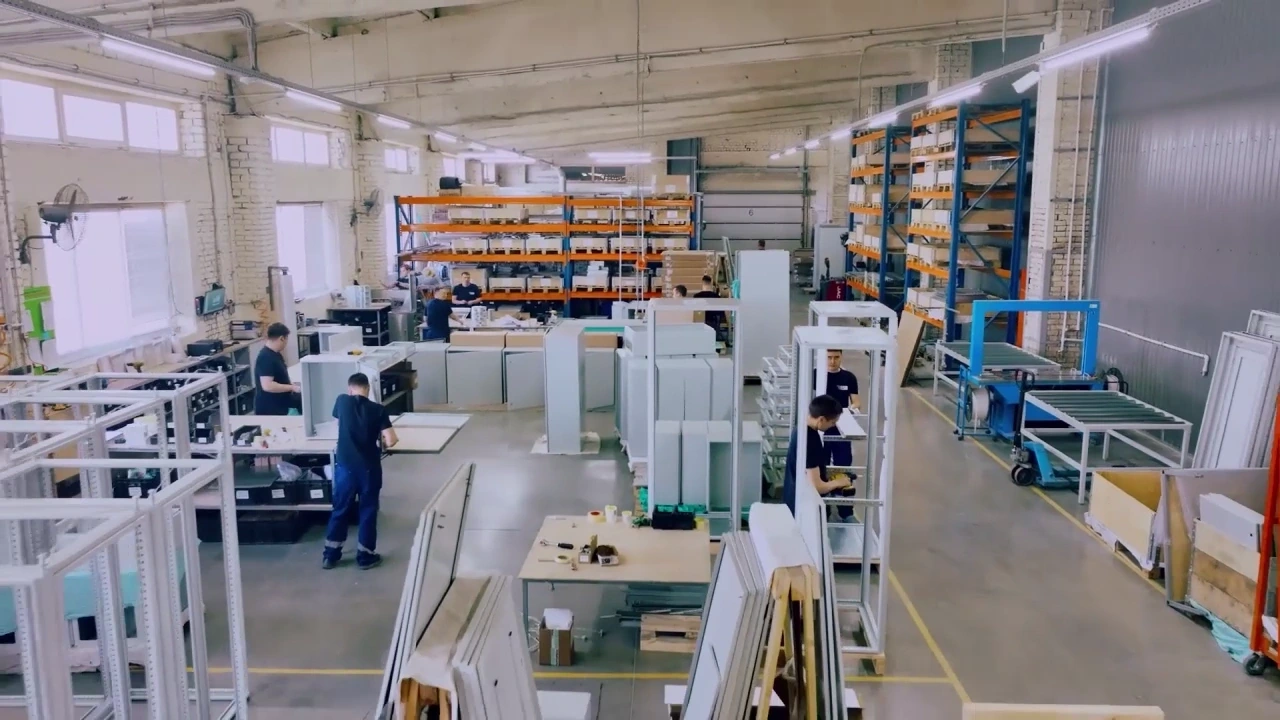 Wide view of the Electric Steel Box assembly workshop, from the film
